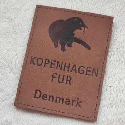 Customizable Embossed Leather Patches using eco friendly top grain leather with blind embossing and color filled embossing techniques for finish